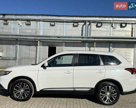 Білий Міцубісі Аутлендер, об'ємом двигуна 2.4 л та пробігом 178 тис. км за 12750 $, фото 5 на Automoto.ua