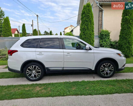 Белый Мицубиси Аутлендер, объемом двигателя 2.4 л и пробегом 145 тыс. км за 14900 $, фото 5 на Automoto.ua