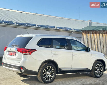 Білий Міцубісі Аутлендер, об'ємом двигуна 2.4 л та пробігом 178 тис. км за 12750 $, фото 10 на Automoto.ua