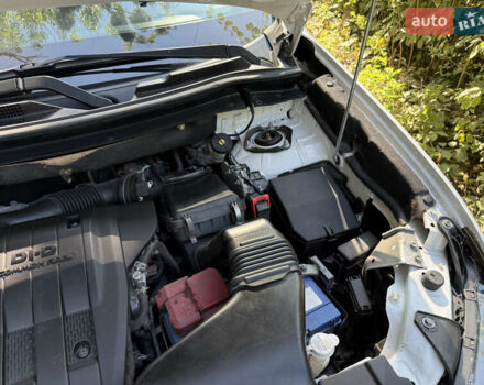 Белый Мицубиси Аутлендер, объемом двигателя 2.2 л и пробегом 240 тыс. км за 17999 $, фото 46 на Automoto.ua