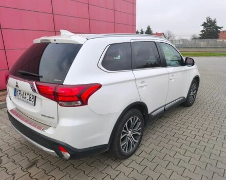 Белый Мицубиси Аутлендер, объемом двигателя 2 л и пробегом 135 тыс. км за 10200 $, фото 4 на Automoto.ua