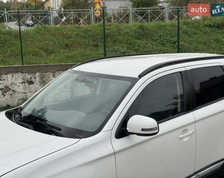 Белый Мицубиси Аутлендер, объемом двигателя 2.36 л и пробегом 225 тыс. км за 14650 $, фото 14 на Automoto.ua