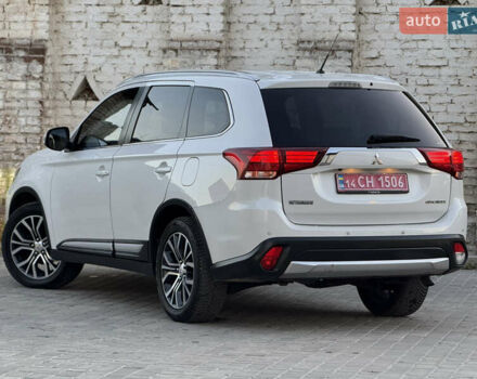 Білий Міцубісі Аутлендер, об'ємом двигуна 2.23 л та пробігом 215 тис. км за 17550 $, фото 30 на Automoto.ua