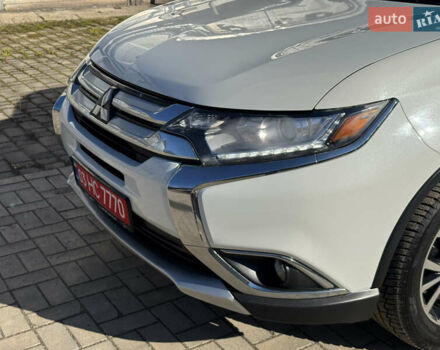 Білий Міцубісі Аутлендер, об'ємом двигуна 2.4 л та пробігом 178 тис. км за 12750 $, фото 19 на Automoto.ua