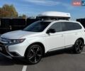 Білий Міцубісі Аутлендер, об'ємом двигуна 2.36 л та пробігом 165 тис. км за 14600 $, фото 1 на Automoto.ua