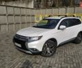 Белый Мицубиси Аутлендер, объемом двигателя 2.36 л и пробегом 152 тыс. км за 15199 $, фото 1 на Automoto.ua