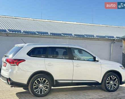 Білий Міцубісі Аутлендер, об'ємом двигуна 2.4 л та пробігом 178 тис. км за 12750 $, фото 11 на Automoto.ua