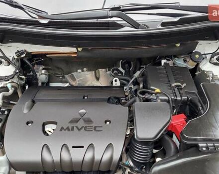 Белый Мицубиси Аутлендер, объемом двигателя 2.35 л и пробегом 127 тыс. км за 19000 $, фото 14 на Automoto.ua