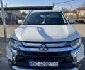 Белый Мицубиси Аутлендер, объемом двигателя 2.2 л и пробегом 198 тыс. км за 16500 $, фото 1 на Automoto.ua