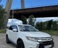 Білий Міцубісі Аутлендер, об'ємом двигуна 2.36 л та пробігом 135 тис. км за 15400 $, фото 1 на Automoto.ua