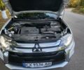 Мицубиси Аутлендер 2016 в Полтаве на Automoto.ua Белый Мицубиси Аутлендер, объемом двигателя 2.36 л и пробегом 240 тыс. км за 14000 $, фото 16 на Automoto.ua