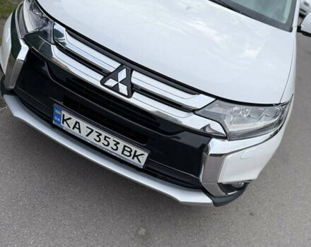 Белый Мицубиси Аутлендер, объемом двигателя 2.36 л и пробегом 134 тыс. км за 18500 $, фото 25 на Automoto.ua