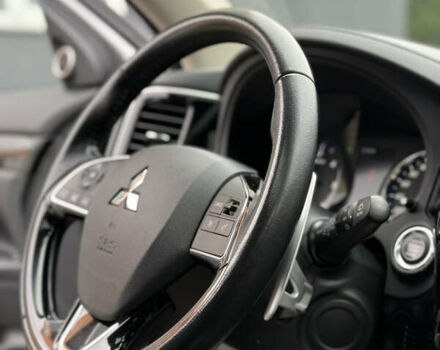 Білий Міцубісі Аутлендер, об'ємом двигуна 2.23 л та пробігом 215 тис. км за 17550 $, фото 52 на Automoto.ua