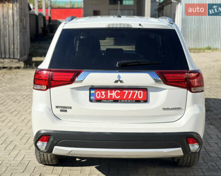 Білий Міцубісі Аутлендер, об'ємом двигуна 2.4 л та пробігом 178 тис. км за 12750 $, фото 8 на Automoto.ua