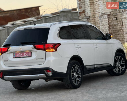 Білий Міцубісі Аутлендер, об'ємом двигуна 2.23 л та пробігом 215 тис. км за 17550 $, фото 20 на Automoto.ua