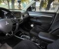 Мицубиси Аутлендер 2016 в Полтаве на Automoto.ua Белый Мицубиси Аутлендер, объемом двигателя 2.36 л и пробегом 240 тыс. км за 14000 $, фото 9 на Automoto.ua