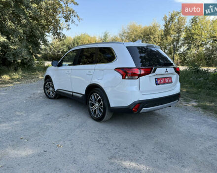Белый Мицубиси Аутлендер, объемом двигателя 2.2 л и пробегом 240 тыс. км за 17999 $, фото 56 на Automoto.ua