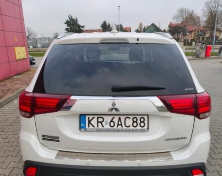 Белый Мицубиси Аутлендер, объемом двигателя 2 л и пробегом 135 тыс. км за 10200 $, фото 6 на Automoto.ua