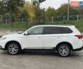 Белый Мицубиси Аутлендер, объемом двигателя 2.36 л и пробегом 225 тыс. км за 14650 $, фото 13 на Automoto.ua