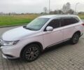 Белый Мицубиси Аутлендер, объемом двигателя 2 л и пробегом 135 тыс. км за 10200 $, фото 1 на Automoto.ua