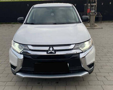 Белый Мицубиси Аутлендер, объемом двигателя 2.36 л и пробегом 151 тыс. км за 16700 $, фото 2 на Automoto.ua