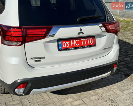 Білий Міцубісі Аутлендер, об'ємом двигуна 2.4 л та пробігом 178 тис. км за 12750 $, фото 27 на Automoto.ua