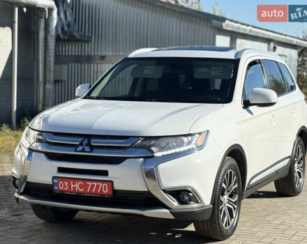 Білий Міцубісі Аутлендер, об'ємом двигуна 2.4 л та пробігом 178 тис. км за 12750 $, фото 2 на Automoto.ua