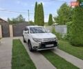Белый Мицубиси Аутлендер, объемом двигателя 2.36 л и пробегом 144 тыс. км за 15499 $, фото 7 на Automoto.ua