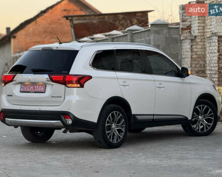 Білий Міцубісі Аутлендер, об'ємом двигуна 2.23 л та пробігом 215 тис. км за 17550 $, фото 23 на Automoto.ua