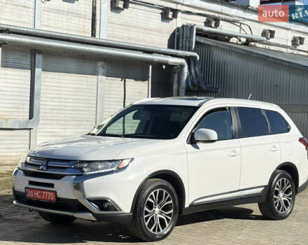 Білий Міцубісі Аутлендер, об'ємом двигуна 2.4 л та пробігом 178 тис. км за 12750 $, фото 3 на Automoto.ua