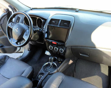 Білий Міцубісі Аутлендер, об'ємом двигуна 2.36 л та пробігом 133 тис. км за 13900 $, фото 8 на Automoto.ua