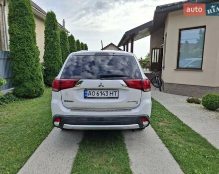 Белый Мицубиси Аутлендер, объемом двигателя 2.36 л и пробегом 144 тыс. км за 15499 $, фото 8 на Automoto.ua