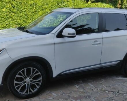 Белый Мицубиси Аутлендер, объемом двигателя 3 л и пробегом 115 тыс. км за 15400 $, фото 17 на Automoto.ua