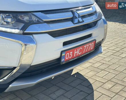 Білий Міцубісі Аутлендер, об'ємом двигуна 2.4 л та пробігом 178 тис. км за 12750 $, фото 17 на Automoto.ua