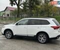 Белый Мицубиси Аутлендер, объемом двигателя 2.36 л и пробегом 225 тыс. км за 14650 $, фото 12 на Automoto.ua