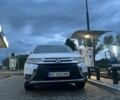 Білий Міцубісі Аутлендер, об'ємом двигуна 2.36 л та пробігом 130 тис. км за 13000 $, фото 1 на Automoto.ua