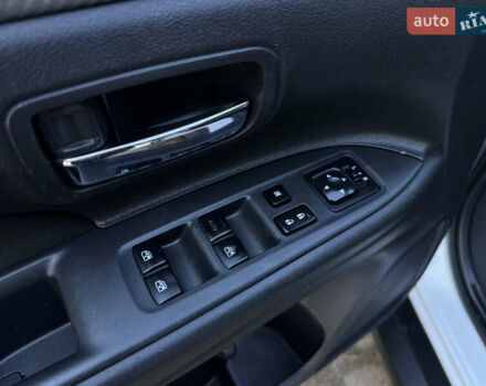 Білий Міцубісі Аутлендер, об'ємом двигуна 2.4 л та пробігом 178 тис. км за 12750 $, фото 37 на Automoto.ua