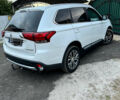 Белый Мицубиси Аутлендер, объемом двигателя 2.3 л и пробегом 180 тыс. км за 16000 $, фото 3 на Automoto.ua