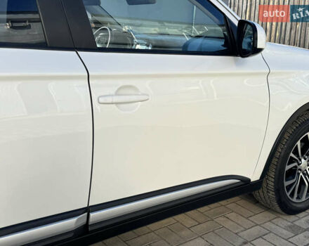 Білий Міцубісі Аутлендер, об'ємом двигуна 2.4 л та пробігом 178 тис. км за 12750 $, фото 33 на Automoto.ua