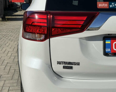 Білий Міцубісі Аутлендер, об'ємом двигуна 2.4 л та пробігом 178 тис. км за 12750 $, фото 28 на Automoto.ua