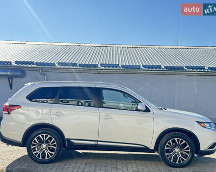 Білий Міцубісі Аутлендер, об'ємом двигуна 2.4 л та пробігом 178 тис. км за 12750 $, фото 12 на Automoto.ua