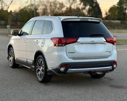 Белый Мицубиси Аутлендер, объемом двигателя 3 л и пробегом 78 тыс. км за 9900 $, фото 6 на Automoto.ua