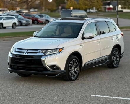 Белый Мицубиси Аутлендер, объемом двигателя 3 л и пробегом 78 тыс. км за 9900 $, фото 2 на Automoto.ua