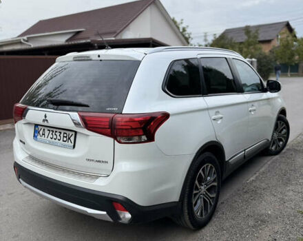 Белый Мицубиси Аутлендер, объемом двигателя 2.36 л и пробегом 134 тыс. км за 18500 $, фото 29 на Automoto.ua