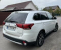 Белый Мицубиси Аутлендер, объемом двигателя 2.36 л и пробегом 134 тыс. км за 18500 $, фото 29 на Automoto.ua