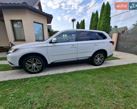 Белый Мицубиси Аутлендер, объемом двигателя 2.4 л и пробегом 145 тыс. км за 14900 $, фото 12 на Automoto.ua