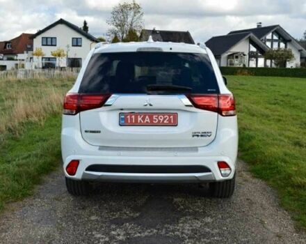 Білий Міцубісі Аутлендер, об'ємом двигуна 2 л та пробігом 164 тис. км за 16900 $, фото 2 на Automoto.ua