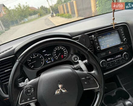 Белый Мицубиси Аутлендер, объемом двигателя 2.36 л и пробегом 134 тыс. км за 18500 $, фото 15 на Automoto.ua