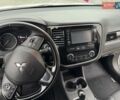 Белый Мицубиси Аутлендер, объемом двигателя 2.36 л и пробегом 225 тыс. км за 14650 $, фото 18 на Automoto.ua