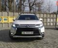 Белый Мицубиси Аутлендер, объемом двигателя 2.36 л и пробегом 152 тыс. км за 15199 $, фото 2 на Automoto.ua